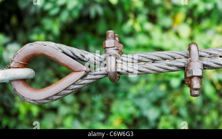 Wire Rope Rust Rusty greased steel wire cable rope clamped around an eyelet with rusty ...