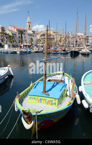 Colourful Painted Wooden Boat, Fishing Boat or Pointu in the Old Port, Pleasure Port or Harbour at Sanary-sur-Mer Côte d'Azur Southern France Stock Photo