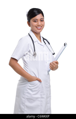 Portrait of a nurse with a clipboard Stock Photo