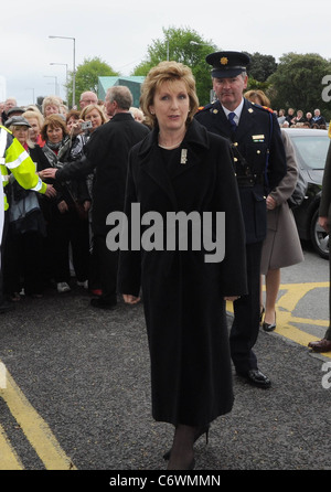 President Mary McAleese The funeral of RTE broadcaster Gerry Ryan at the Church of St. John the Baptist, Clontarf, Dublin, Stock Photo