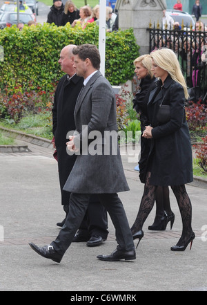 Keith Duffy, Lisa Duffy, Yvonne Keating The funeral of RTE broadcaster Gerry Ryan at the Church of St. John the Baptist, Stock Photo