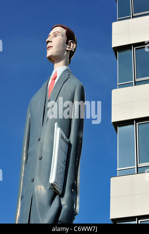 Sculpture The Long Banker / Langer Baenker in front of the Deka Bank at the  Kirchberg plateau, Luxembourg Stock Photo