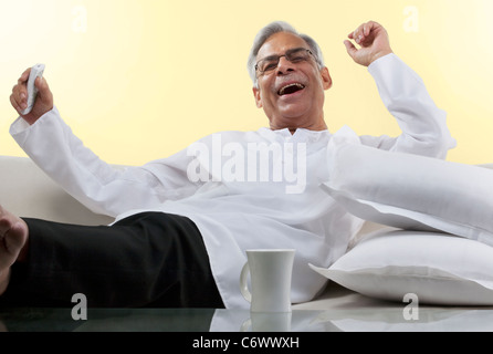 Old man enjoying himself Stock Photo