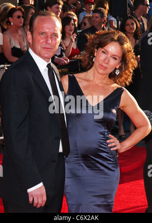 Clark Gregg and Jennifer Grey arrive at the 'Iron Man 2' world premiere held at El Capitan Theatre Hollywood, California - Stock Photo