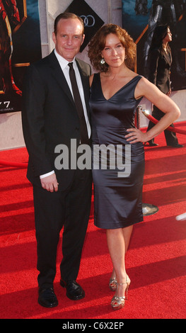 Clark Gregg and Jennifer Grey arrive at the 'Iron Man 2' world premiere held at El Capitan Theatre Hollywood, California - Stock Photo