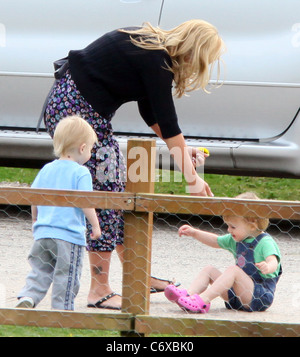Kerry Katona feeding the ducks with her children Max and Heidi Sussex