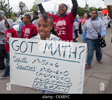 Detroit, Michigan - High school students in the Wayne State University Math Corps program march in the Labor Day parade. Stock Photo