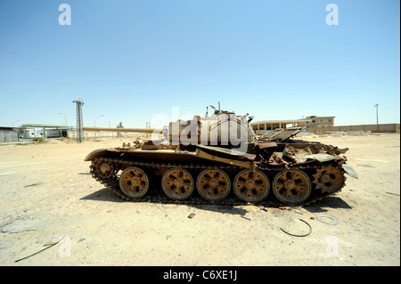 a blow up, destroyed T54 tank in the desert north of Ajadabiya Libya Stock Photo