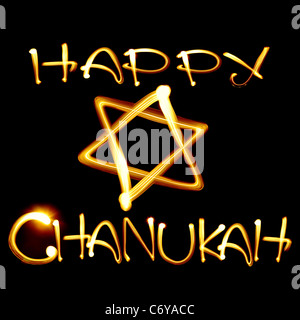 Created by light text Happy Chanukah and jewish star over black background Stock Photo