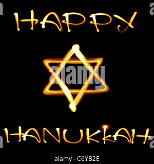 Created by light text Happy Hanukkah and jewish star over black background Stock Photo