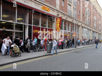 Atmosphere Hundreds of WWE fans line-up to meet their wrestling heroes Dolph Ziggler and Beth Phoenix at Smyths Toy Store on Stock Photo