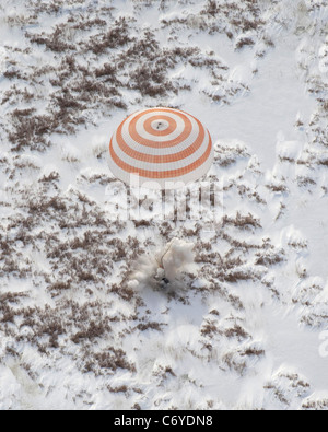 Expedition 22 Crew Lands The Soyuz TMA-16 spacecraft is seen as it lands with Expedition 22 Commander Jeff Williams and Flight Stock Photo