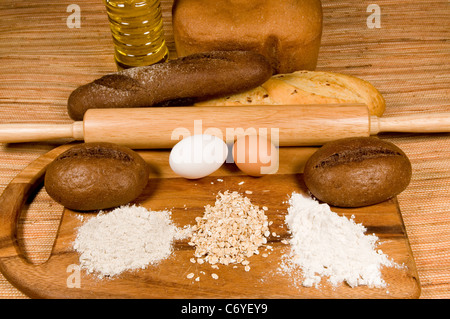 Components for a bread batch lie on a table. Stock Photo