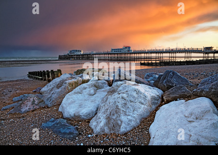 Storm clouds over Worthing Pier at Sunset, West Sussex Stock Photo