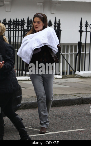 Carly Zucker The England and Chelsea Football player Joe Cole with wife Carly Zucker and their newly born baby girl leaving Stock Photo