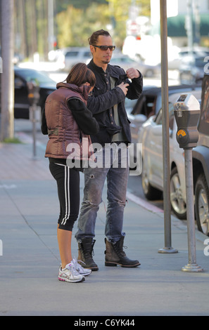 Chris Cornell and his wife Vicky take a stroll along Bedford Drive Los
