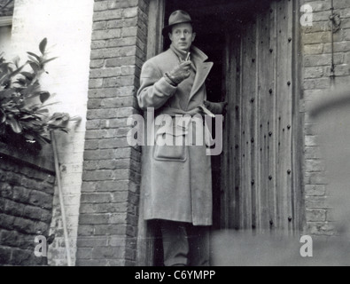 LESLIE HOWARD (1893-1943) English actor at his Westcott, Dorking, Surrey house in 1939. 'Stowe Maries' is 16th century Stock Photo