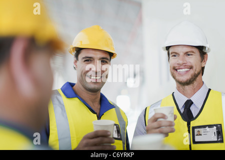 Workers having coffee together Stock Photo