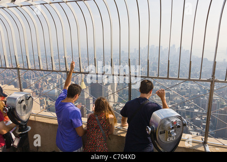 Tourists on Observation deck of Empire State Building in New York Stock ...