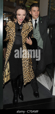 Joan Collins leaving the Ivy Club, wearing a leopard print coat London ...