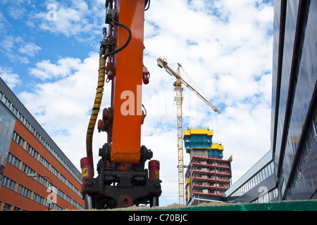 Crane at construction site in city Stock Photo