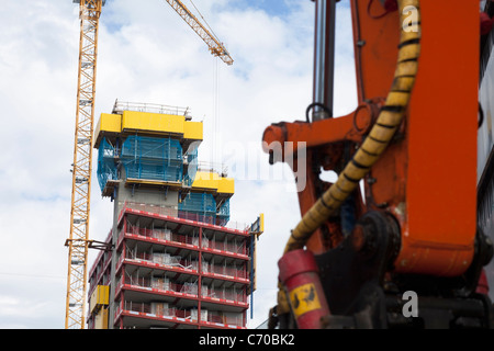 Crane at construction site in city Stock Photo