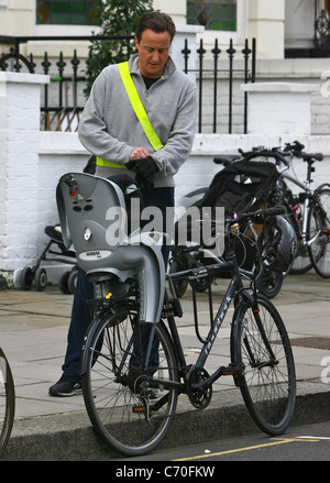 David Cameron on his bike after dropping his children off at school London, England - 17.03.10 Mark Douglas Stock Photo