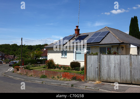 1930s period bungalow with solar panels mounted on roof, Southborough , Tunbridge Wells , Kent , England Stock Photo