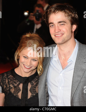 Robert Pattinson and Emilie De Ravin 'Remember Me' UK film premiere held at the Odeon Leicester Square. London, England - Stock Photo