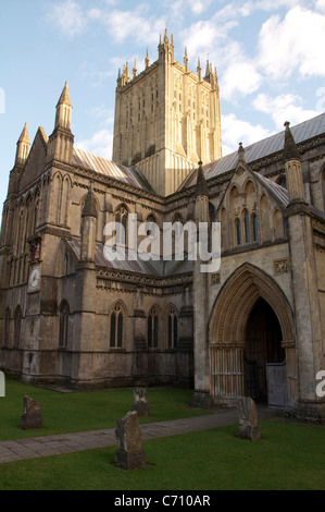 Wells Cathedral, in Somerset, with its elegant medieval tower and sumptuous entrance porch, viewed from the north side. England, United Kingdom. Stock Photo