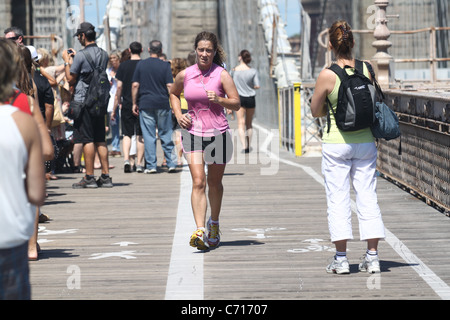 Woman exercising in the city Stock Photo