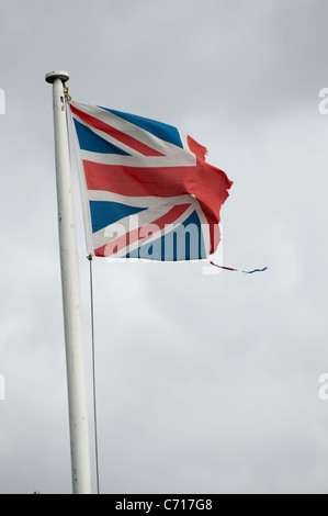 union jack flag ripped and torn Stock Photo
