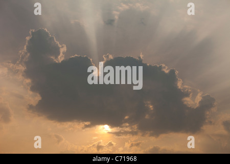 Sunbeams through clouds , Finland Stock Photo