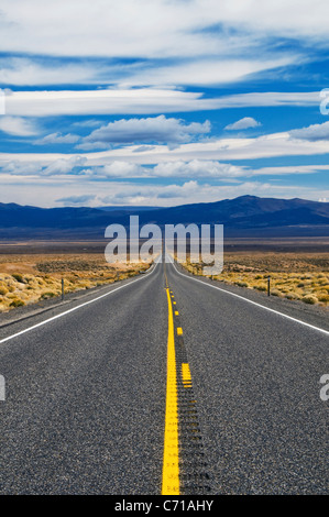 Highway 50, The Loneliest Road in America, disappears into the distance in the Nevada desert.