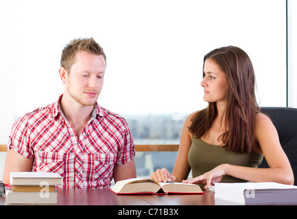 One on one teaching session in the library Stock Photo