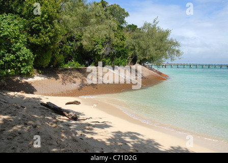 sea wall built to protect beach from erosion, Green Island, Great Barrier Reef, Queensland, Australia Stock Photo