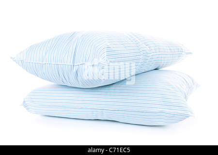 Two soft pillows with blue striped covers isolated on white background Stock Photo