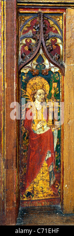 North Elmham rood screen, St. Barbara, holding Tower of a castle, female saint saints English screens church churches England Stock Photo