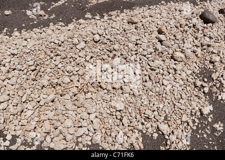 volcanic rocks and stones on the beach at Vlychada, Santorini Stock Photo