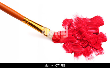 Red brushstrokes and the brush on a white background. Stock Photo