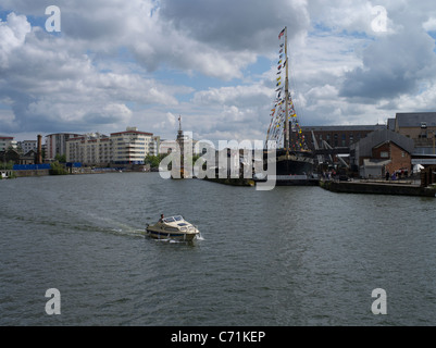 dh  BRISTOL DOCKS BRISTOL Motor boat in floating harbour and SS Great Britain drydock Stock Photo