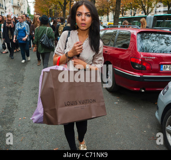 Paris, France, Woman Carrying Louis Vuitton Shopping Bags on