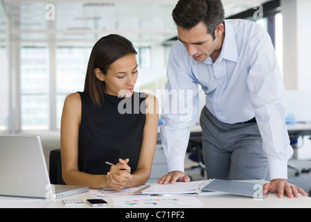 Colleagues discussing work Stock Photo