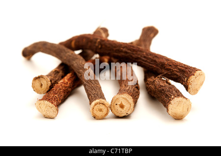 Liquorice roots on a white background Stock Photo