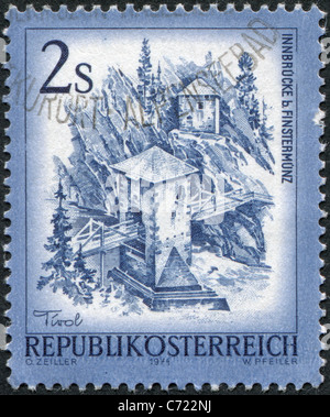 AUSTRIA - 1974: A stamp printed in Austria, is shown Inn Bridge, Finstermuenz Stock Photo