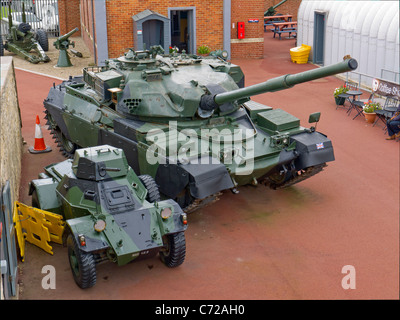 An Fv 4201 Chieftain tank which type entered service in 1967 and a small armoured car at the Heugh Battery Museum Hartlepool Stock Photo