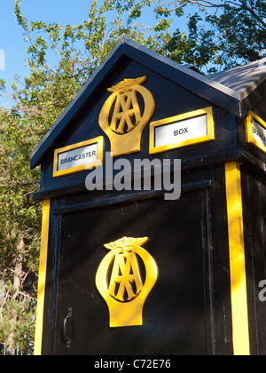 An old fashioned AA Automobile Association telephone box at Brancaster Norfolk Stock Photo