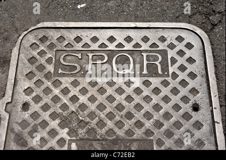 Italy, Rome, SPQR manhole cover Stock Photo