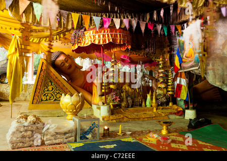 Reclining Buddha statue in Kompong Trach cave - Kampot Province, Cambodia Stock Photo