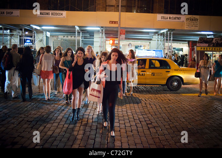 Hordes of shoppers descend on the trendy Meatpacking District in New York during the third annual Fashion's Night Out Stock Photo